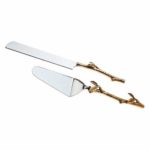 2 Piece Gold leaf (twig) Cake Server Set. 1 Cake Knife and 1 Cake Server. Leaf Design 2 Tone Made of Stainless Steel and Brass. Ideal for Weddings, Party’s, Elegant events.